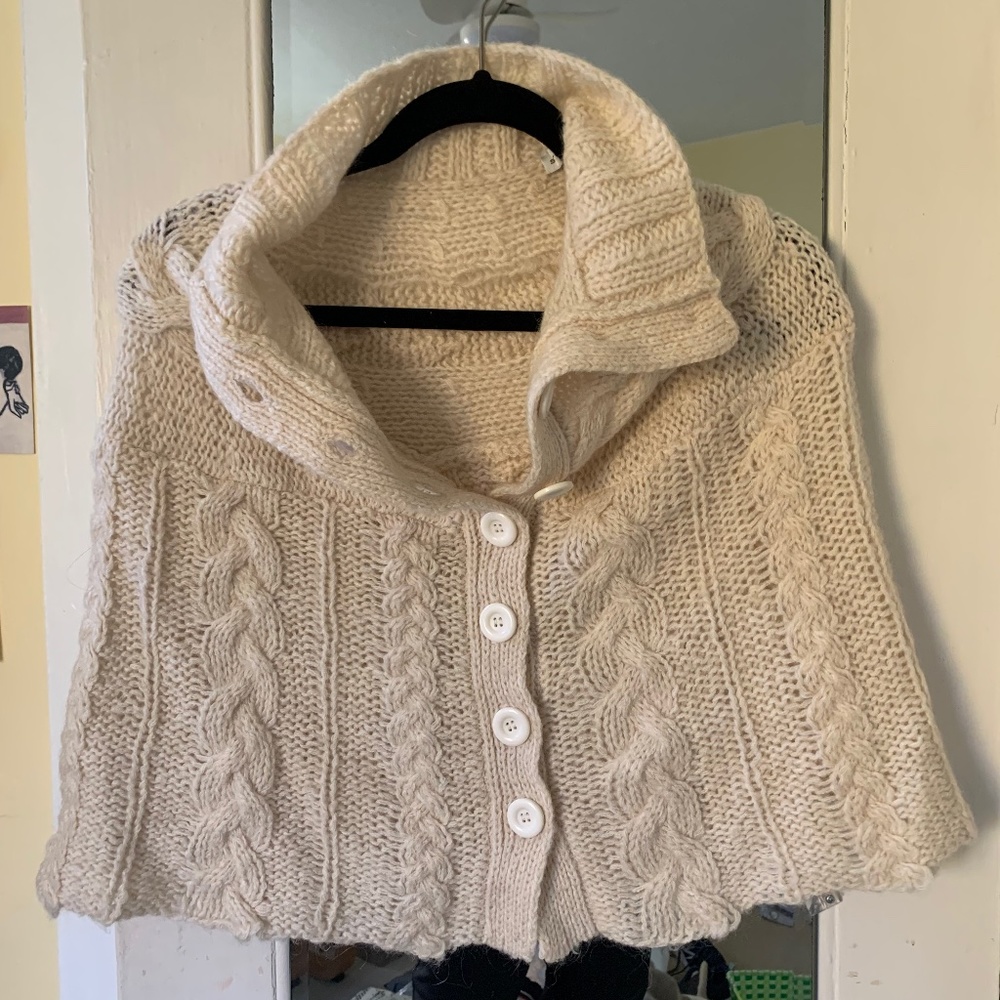 Steve Madden Off Winter White Shoulder Cape with cable knit detail.